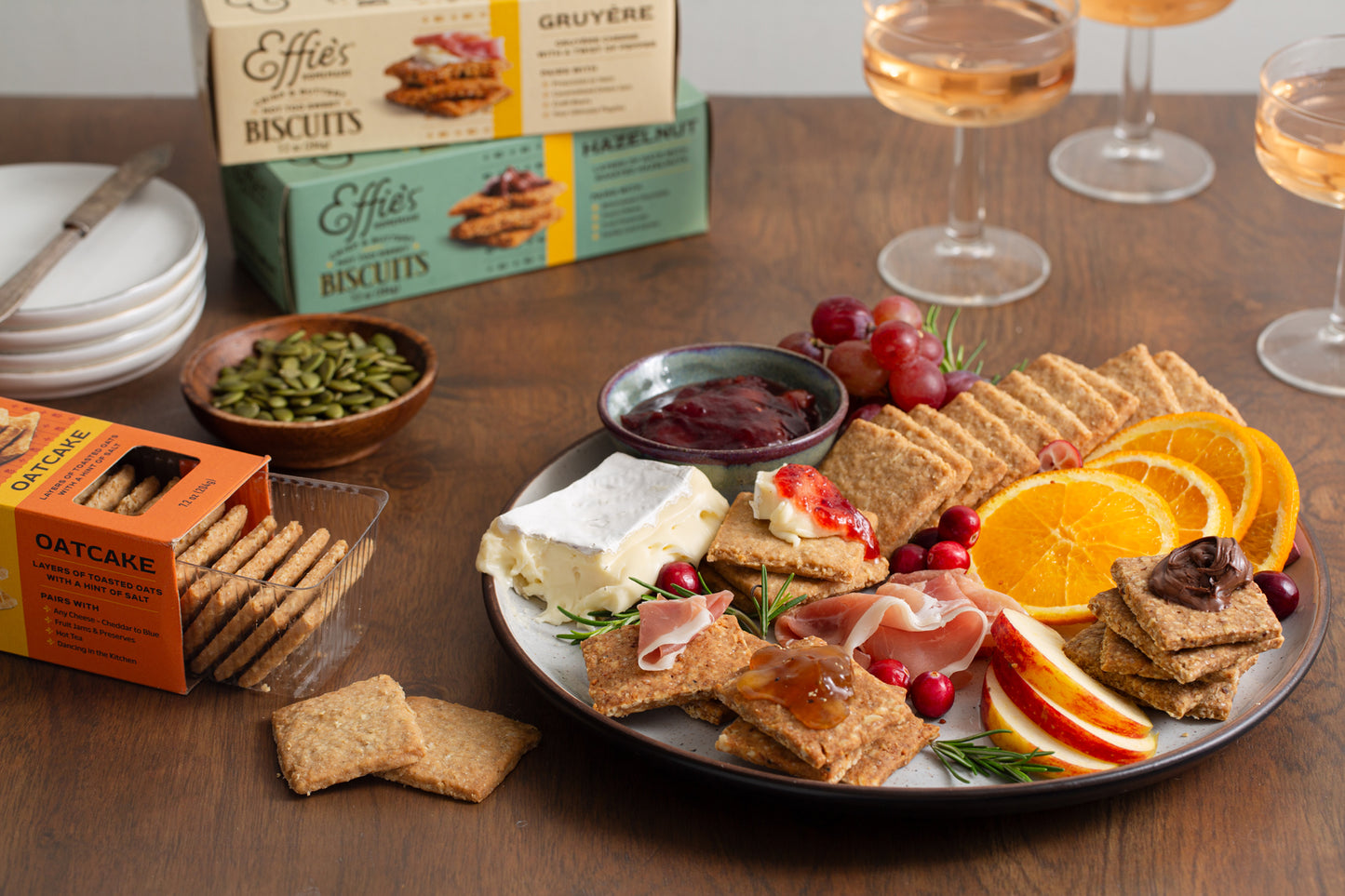 Effie's Biscuit Sampler 12-Pack featuring a variety of biscuits with a display of cheeses, fruits, and nuts for pairing.